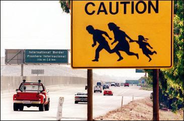 CautionSign-IllegalsCrossing.jpg