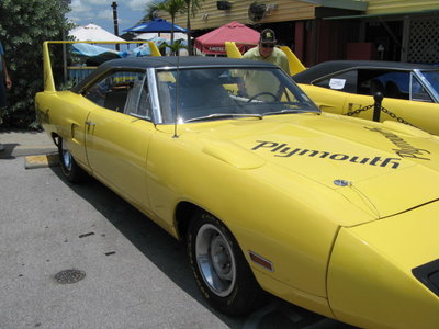 Plymouth Superbird appeared to have original paint, but I've never seen stickers on the hood like that. The Superbird in the background was a raffle car.